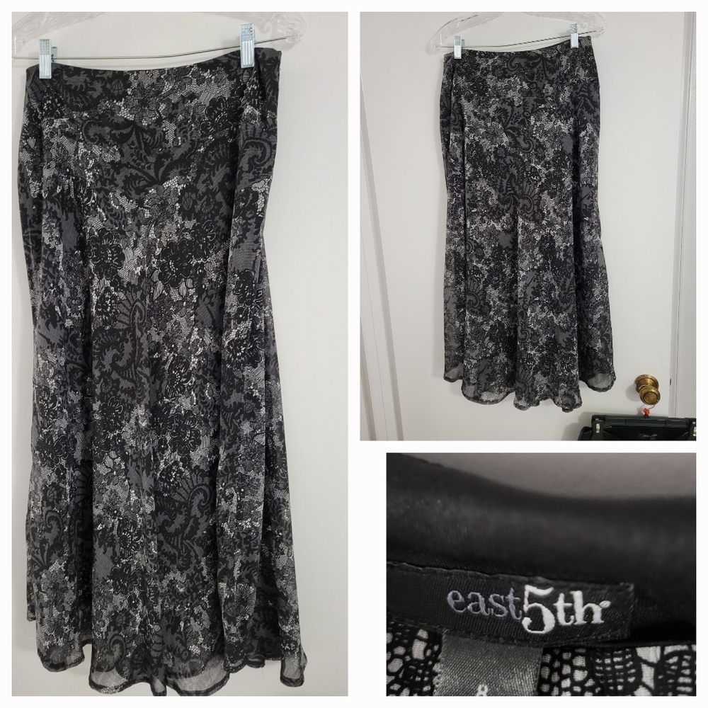 Black and gray floral pattern skirt. Has lining.